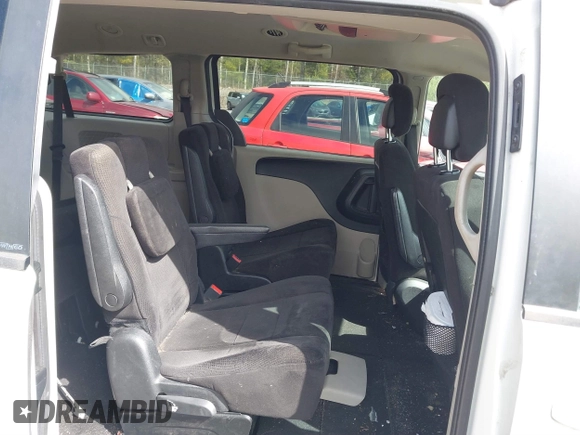 2012 Dodge Grand Caravan SXT with VIN 2C4RDGCGXCR248859, listed as a IAAI auction lot 41829411 with 111,515 mi miles and . Bid and sale history available at DreamBid. Image 8.