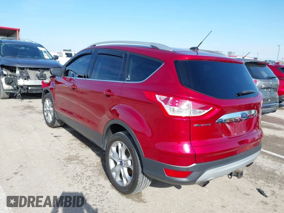 2015 Ford Escape Titanium with VIN 1FMCU9J97FUB57833, listed as a IAAI auction lot 41894505 with 176,975 mi miles. Bid and sale history available at carsss.com. Image 3.