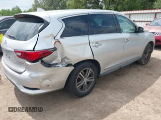 2019 Infiniti QX60 Luxe with VIN 5N1DL0MN0KC511333, listed as a IAAI auction lot 42070088 with 117,796 mi miles and . Bid and sale history available at DreamBid. Image 4.