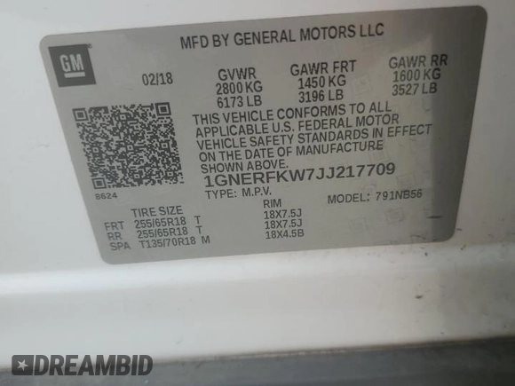 2018 Chevrolet Traverse LS with VIN 1GNERFKW7JJ217709, listed as a Copart auction lot 63332405 with 127,758 mi miles and Salvage title. Bid and sale history available at DreamBid. Image 13.