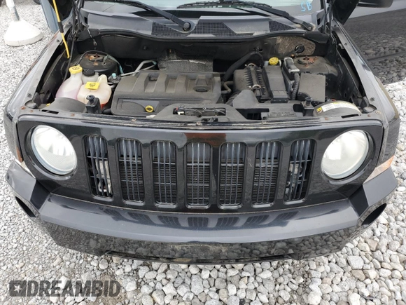 2010 Jeep Patriot Sport z VIN 1J4NF2GB4AD512307, wystawiony jako Copart lot #57686005 z przebiegiem 92 884 mil mil oraz Czysty tytuł • Clean title. Historia ofert i sprzedaży dostępna na DreamBid. Obrazek 12.