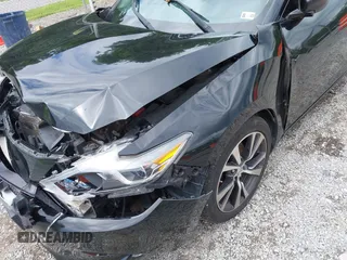 2017 Nissan Maxima SL with VIN 1N4AA6AP9HC385851, listed as a IAAI auction lot 42486634 with 98,599 mi miles and . Bid and sale history available at DreamBid. Image 17.