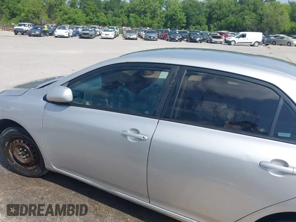 2012 Toyota Corolla L with VIN 2T1BU4EE1CC773885, listed as a IAAI auction lot 42004443 with 192,607 mi miles. Bid and sale history available at carsss.com. Image 14.