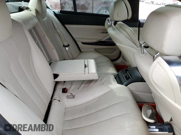 2013 BMW 6 Series 650i with VIN WBA6B2C50DDG66703, listed as a Copart auction lot 82225824 with 199,076 mi miles and Salvage Title. Bid and sale history available at DreamBid. Image 10.