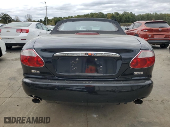 2006 Jaguar XK with VIN SAJDA42C462A44968, listed as a Copart auction lot 75758524 with 77,266 mi miles and Salvage Title. Bid and sale history available at carsss.com. Image 6.