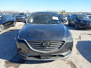 2023 Mazda CX-9 Carbon Edition z VIN JM3TCBDY2P0633889, wystawiony jako IAAI lot #41804791 z przebiegiem 20 454 mil mil oraz . Historia ofert i sprzedaży dostępna na DreamBid. Obrazek 12.