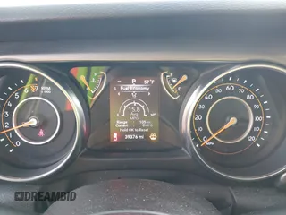 2023 Jeep Gladiator Sport S z VIN 1C6HJTAG7PL535209, wystawiony jako IAAI lot #41483780 z przebiegiem 39 376 mil mil oraz . Historia ofert i sprzedaży dostępna na DreamBid. Obrazek 7.