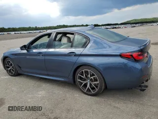 2023 BMW 5 Series M550i xDrive with VIN WBA13BK06PCM31937, listed as a Copart auction lot 66490494 with 24,972 mi miles and Salvage title. Bid and sale history available at DreamBid. Image 2.