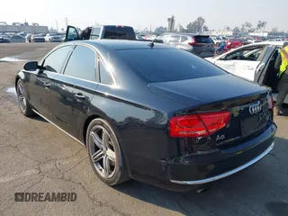 2011 Audi A8 with VIN WAUAVAFD6BN023937, listed as a IAAI auction lot 41288464 with 158,127 mi miles and . Bid and sale history available at DreamBid. Image 3.