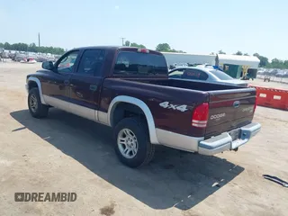 2004 Dodge Dakota SLT with VIN 1D7HG48N24S556431, listed as a IAAI auction lot 42591078 with 213,777 mi miles and . Bid and sale history available at DreamBid. Image 3.