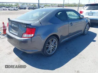 2013 Scion tC with VIN JTKJF5C73D3061994, listed as a IAAI auction lot 41785859 with 133,610 mi miles. Bid and sale history available at carsss.com. Image 4.