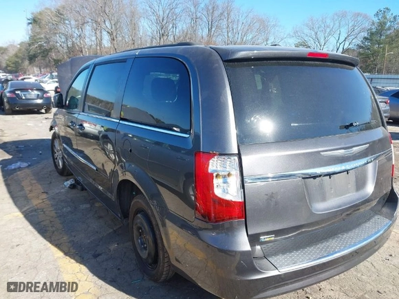 2016 Chrysler Town & Country Touring with VIN 2C4RC1BG4GR297286, listed as a IAAI auction lot 41333098 with 216,500 mi miles. Bid and sale history available at carsss.com. Image 3.