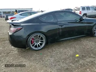 2013 Hyundai Genesis Coupe Track z VIN KMHHU6KJ4DU089727, wystawiony jako Copart lot #50002495 z przebiegiem 99 869 mil mil oraz Szkoda całkowita • Salvage title. Historia ofert i sprzedaży dostępna na DreamBid. Obrazek 14.