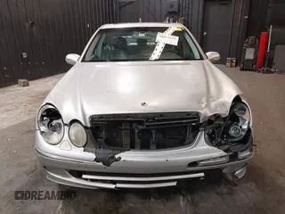 2003 Mercedes-Benz E 500 with VIN WDBUF70J03A101277, listed as a IAAI auction lot 40872555 with 330,553 mi miles and . Bid and sale history available at DreamBid. Image 6.