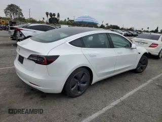 2020 Tesla Model 3 Standard Range Plus with VIN 5YJ3E1EA5LF747010, listed as a Copart auction lot 50937975 with Not Provided miles and Salvage Title. Bid and sale history available at DreamBid. Image 3.