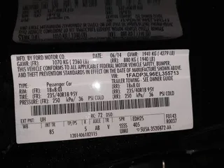 2014 Ford Focus ST with VIN 1FADP3L96EL355713, listed as a IAAI auction lot 41572939 with 102,838 mi miles and . Bid and sale history available at carsss.com. Image 9.