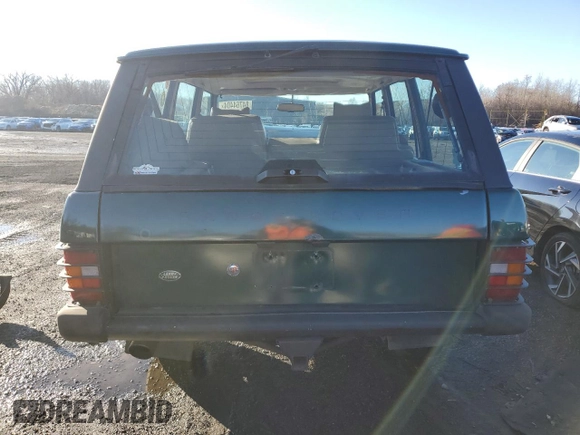 1994 Land Rover Range Rover with VIN SALHV1245RA640425, listed as a Copart auction lot 84764404 with 173,181 mi miles and Salvage Title. Bid and sale history available at DreamBid. Image 6.
