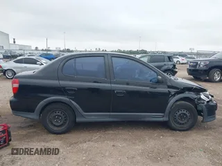 2000 Toyota ECHO z VIN JTDBT1231Y0098187, wystawiony jako IAAI lot #41611994 z przebiegiem 94 750 mil mil oraz . Historia ofert i sprzedaży dostępna na DreamBid. Obrazek 13.