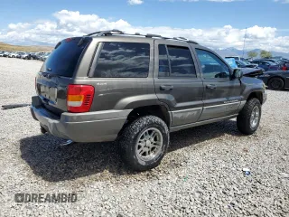1999 Jeep Grand Cherokee Laredo с VIN 1J4GW58S5XC612309, выставлен на аукционе Copart как лот 56705085 с пробегом 200 004 миль миль и Списание • Salvage title. История ставок и продаж доступна на DreamBid. Изображение 3.