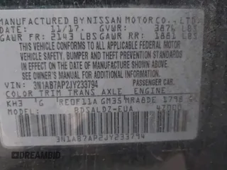2018 Nissan Sentra S with VIN 3N1AB7AP2JY233794, listed as a IAAI auction lot 41855577 with 103,724 mi miles and . Bid and sale history available at carsss.com. Image 9.