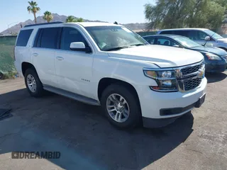 2015 Chevrolet Tahoe LT z VIN 1GNSCBKC0FR227803, wystawiony jako IAAI lot #42564549 z przebiegiem Nie podano mil oraz . Historia ofert i sprzedaży dostępna na DreamBid. Obrazek 1.