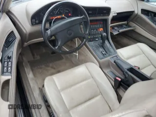 1995 BMW 8 Series z VIN WBAEF6328SCC89764, wystawiony jako Copart lot #82695124 z przebiegiem 94 177 mil mil oraz Czysty tytuł • Clean title. Historia ofert i sprzedaży dostępna na DreamBid. Obrazek 8.