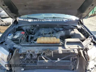 2015 Ford F-150 XLT with VIN 1FTEW1EP7FKE12574, listed as a Copart auction lot 59519985 with 133,337 mi miles and Salvage title. Bid and sale history available at DreamBid. Image 11.