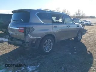 2020 Infiniti QX80 LUXE with VIN JN8AZ2NE5L9253264, listed as a IAAI auction lot 41012767 with 106,672 mi miles. Bid and sale history available at carsss.com. Image 4.