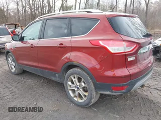 2015 Ford Escape Titanium with VIN 1FMCU9JX1FUA56091, listed as a IAAI auction lot 41947035 with 191,297 mi miles and . Bid and sale history available at DreamBid. Image 3.