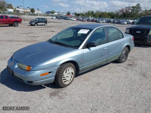 2002 Saturn SL with VIN 1G8ZJ52752Z117416, listed as a IAAI auction lot 41486679 with 318,311 mi miles. Bid and sale history available at carsss.com. Image 2.