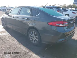2017 Ford Fusion SE with VIN 3FA6P0HD4HR311462, listed as a IAAI auction lot 41824553 with 124,911 mi miles. Bid and sale history available at carsss.com. Image 3.