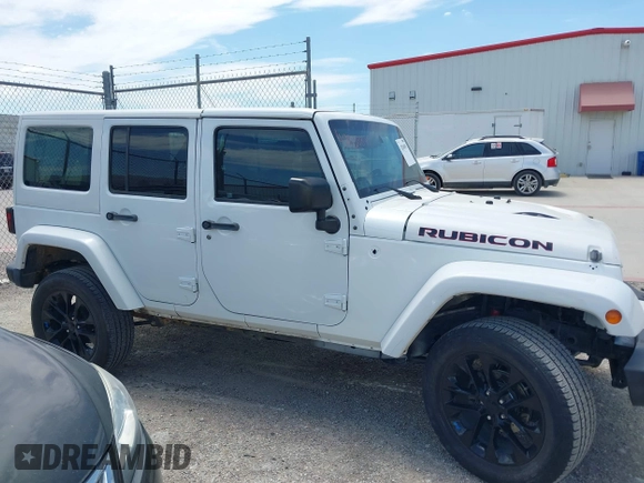 2015 Jeep Wrangler Unlimited Rubicon z VIN 1C4BJWFG1FL544883, wystawiony jako IAAI lot #42838891 z przebiegiem 87 801 mil mil oraz . Historia ofert i sprzedaży dostępna na DreamBid. Obrazek 13.