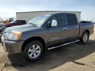 2012 Nissan Titan SV z VIN 1N6AA0ECXCN318037, wystawiony jako Copart lot #56601755 z przebiegiem 252 968 mil mil oraz Szkoda całkowita • Salvage title. Historia ofert i sprzedaży dostępna na DreamBid. Obrazek 1.