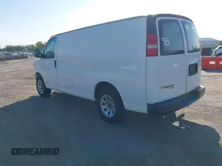 2014 Chevrolet Express Cargo Van with VIN 1GCSGAFX2E1151373, listed as a IAAI auction lot 42045528 with 123,718 mi miles. Bid and sale history available at carsss.com. Image 3.