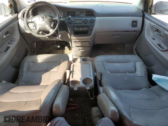 2003 Honda Odyssey EX-L with VIN 5FNRL18903B145567, listed as a Copart auction lot 47925695 with 294,627 mi miles and Salvage Title. Bid and sale history available at DreamBid. Image 8.