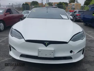 2022 Tesla Model S Plaid with VIN 5YJSA1E65NF488864, listed as a IAAI auction lot 41772788 with 33,915 mi miles and . Bid and sale history available at DreamBid. Image 12.