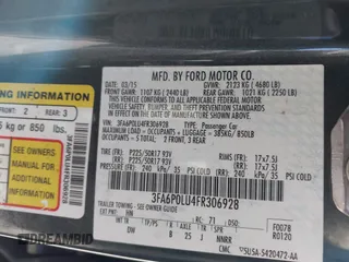 2015 Ford Fusion SE Hybrid with VIN 3FA6P0LU4FR306928, listed as a IAAI auction lot 41826720 with 83,983 mi miles. Bid and sale history available at carsss.com. Image 9.