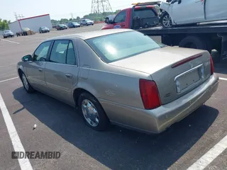 2002 Cadillac DeVille z VIN 1G6KD54Y12U219770, wystawiony jako IAAI lot #42474317 z przebiegiem 122 776 mil mil oraz . Historia ofert i sprzedaży dostępna na DreamBid. Obrazek 3.