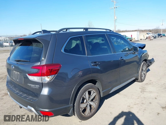 2021 Subaru Forester Touring with VIN JF2SKAXC3MH453658, listed as a IAAI auction lot 41635515 with 43,163 mi miles. Bid and sale history available at carsss.com. Image 4.