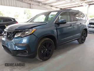 2021 Honda Pilot Special Edition with VIN 5FNYF5H27MB011413, listed as a IAAI auction lot 42082680 with 27,474 mi miles and . Bid and sale history available at carsss.com. Image 2.