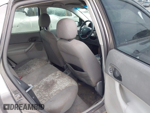 2005 Ford Focus S with VIN 1FAFP34N05W309572, listed as a IAAI auction lot 41861194 with 216,943 mi miles. Bid and sale history available at carsss.com. Image 8.