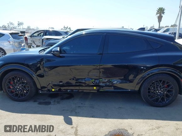 2023 Ford Mustang Mach-E GT with VIN 3FMTK4SX5PMA06095, listed as a IAAI auction lot 42203596 with 27,664 mi miles and . Bid and sale history available at DreamBid. Image 14.