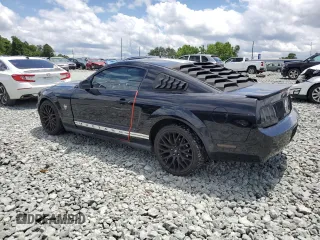 2009 Ford Mustang z VIN 1ZVHT80N295128967, wystawiony jako Copart lot #59182115 z przebiegiem 91 119 mil mil oraz Szkoda całkowita • Salvage title. Historia ofert i sprzedaży dostępna na DreamBid. Obrazek 2.