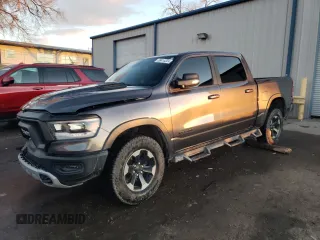 2019 Ram 1500 Rebel z VIN 1C6SRFLT2KN839359, wystawiony jako Copart lot #86414324 z przebiegiem Nie podano mil oraz Szkoda całkowita • Salvage title. Historia ofert i sprzedaży dostępna na DreamBid. Obrazek 1.