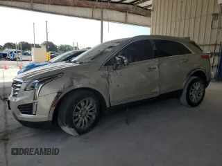 2017 Cadillac XT5 FWD с VIN 1GYKNARSXHZ157248, выставлен на аукционе Copart как лот 55060525 с пробегом 70 847 миль миль и Списание • Salvage title. История ставок и продаж доступна на DreamBid. Изображение 1.