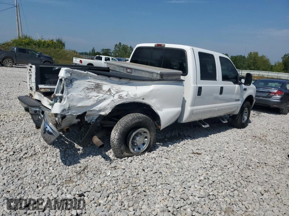 2002 Ford Super Duty F-250 XL with VIN 1FTNW21F72ED29593, listed as a Copart auction lot 68245844 with 301,129 mi miles and Salvage Title. Bid and sale history available at carsss.com. Image 3.