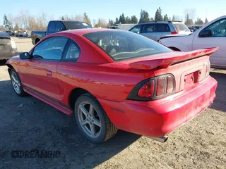 1996 Ford Mustang with VIN 1FALP4042TF180575, listed as a IAAI auction lot 41561882 with 248,183 mi miles. Bid and sale history available at carsss.com. Image 3.