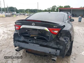 2016 Nissan Maxima SV with VIN 1N4AA6AP8GC426999, listed as a IAAI auction lot 42627802 with 160,643 mi miles and . Bid and sale history available at DreamBid. Image 6.
