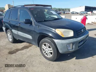 2001 Toyota RAV4 with VIN JTEHH20V410031588, listed as a IAAI auction lot 41972952 with 280,055 mi miles and . Bid and sale history available at DreamBid. Image 1.