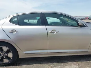 2012 Kia Optima Hybrid with VIN KNAGM4AD7C5032069, listed as a IAAI auction lot 41905979 with 96,842 mi miles. Bid and sale history available at carsss.com. Image 13.